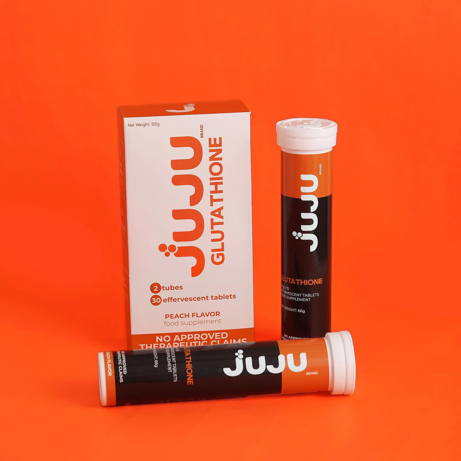 Juju Glutathione Effervescent Tablets in Orange Background